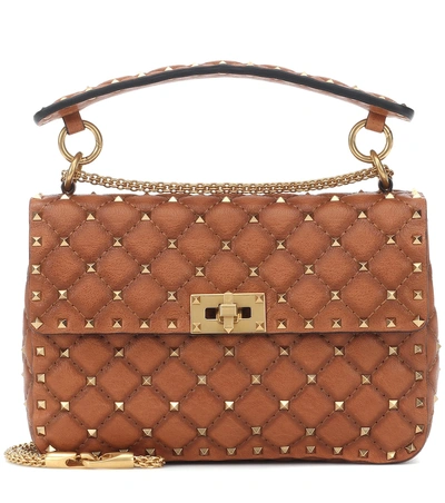 Shop Valentino Rockstud Spike Medium Leather Shoulder Bag In Brown