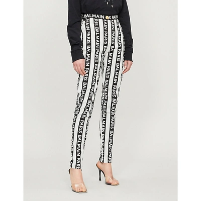 Shop Balmain Logo-striped High-rise Skinny Cotton-blend Trousers In Black White