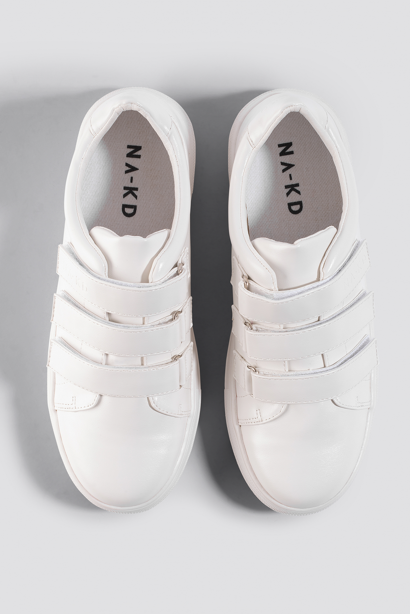 white velcro sneakers