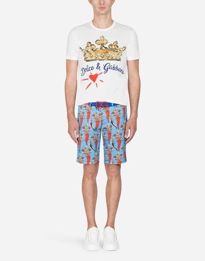 Shop Dolce & Gabbana Printed Stretch Cotton Bermuda Shorts In Multi-colored