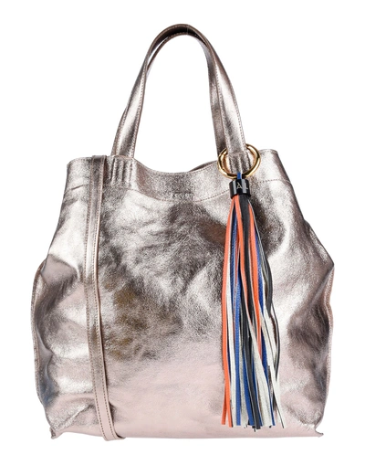 Shop Almala Handbag In Bronze