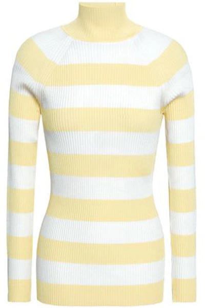 Shop Zimmermann Striped Ribbed-knit Turtleneck Sweater In Pastel Yellow