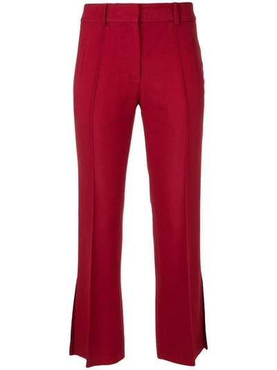 Shop Khaite Cropped Side Slits Trousers - Red