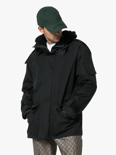 Shop Yves Salomon Bachette Shearling Lined Hooded Coat In C99 Black