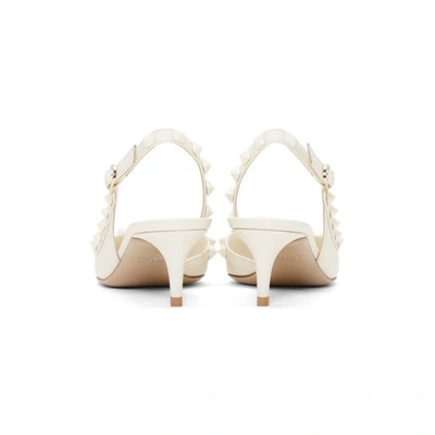 Shop Valentino White  Garavani Rockstud Slingback Heels In A03 Ivory