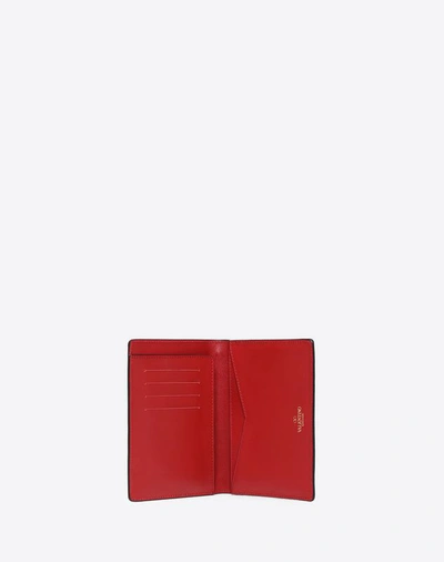 Shop Valentino Garavani Rockstud Zipped Wallet In Rosso