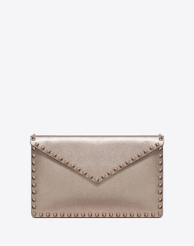 Shop Valentino Garavani Rockstud Pouch In Champagne