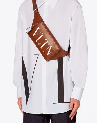 Shop Valentino Garavani Uomo Leather Vltn Belt Bag In Tan