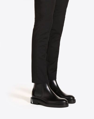 Shop Valentino Garavani Uomo Vltn Brush-off Calfskin Beatle Boots In Black