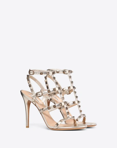 Shop Valentino Garavani Rockstud Metallic Calfskin Leather Ankle Strap Sandal 100 Mm In Skin