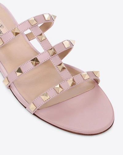 Shop Valentino Garavani Rockstud Flat Slide Sandal In Water Rose