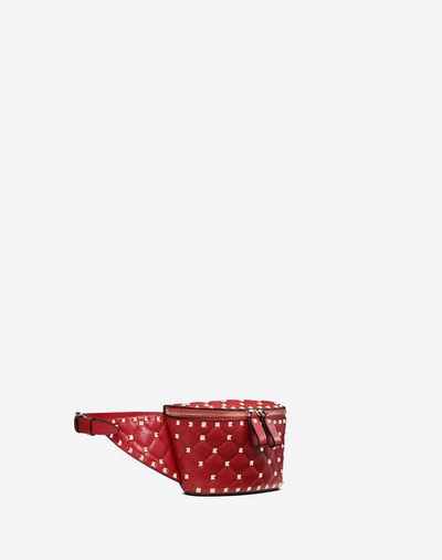 Shop Valentino Garavani Rockstud Spike Nappa Leather Belt Bag In Rosso