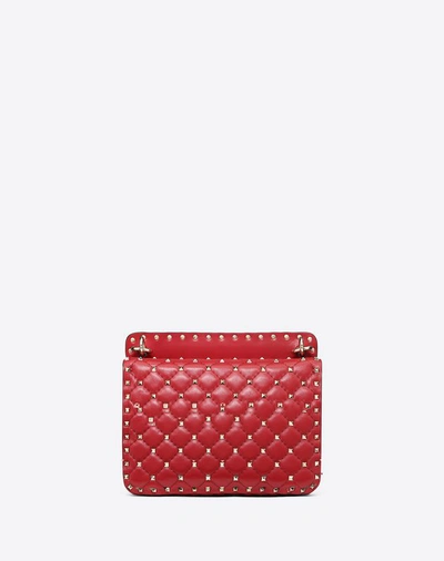 Shop Valentino Garavani Medium Rockstud Spike Nappa Leather Bag In Rosso