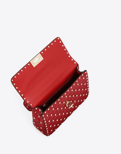 Shop Valentino Garavani Medium Rockstud Spike Nappa Leather Bag In Rosso