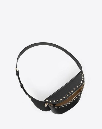 Shop Valentino Garavani Rockstud Grainy Calfskin Belt Bag In Black