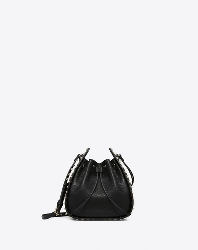 Shop Valentino Small Grain Calfskin Leather Rockstud Bucket Bag In Black