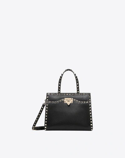 Shop Valentino Small Rockstud Top Handle Bag In Black