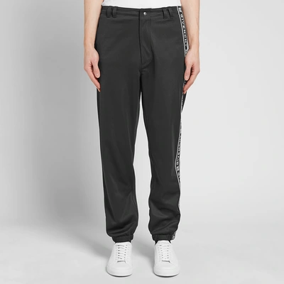 Shop Givenchy Popper Detail Taped Track Pant In Black