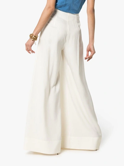 Shop Jacquemus High-waisted Wide Leg Pleated Trousers In White
