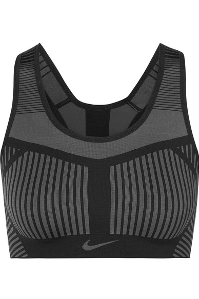 Shop Nike Fe/nom Striped Flyknit Sports Bra In Black