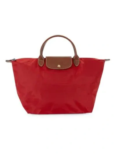 Shop Longchamp Medium Le Pliage Tote In Red
