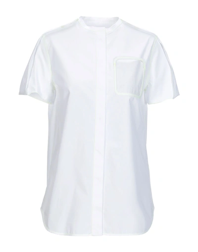 Shop Courrèges Solid Color Shirts & Blouses In White
