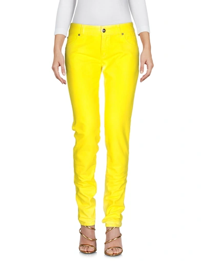 Shop Versace Denim Pants In Yellow