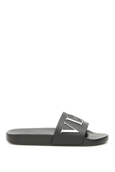 Shop Valentino Vltn Slides In Nero Bianco|nero