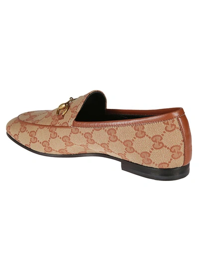 Shop Gucci Logo Motif Loafers In Beige