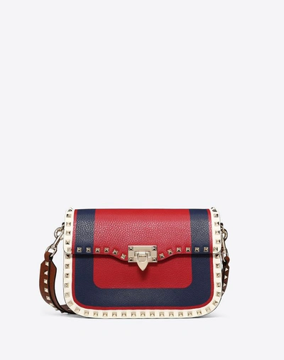 Shop Valentino Medium Inlayed Rockstud Crossbody Bag In Red
