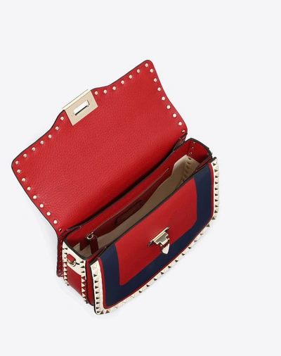 Shop Valentino Medium Inlayed Rockstud Crossbody Bag In Red