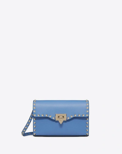Shop Valentino Small Rockstud Grainy Calfskin Crossbody Bag In Blue