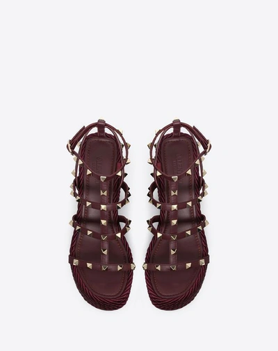 Shop Valentino Garavani Rockstud Ankle Strap Wedge Sandal 95 Mm In Ruby