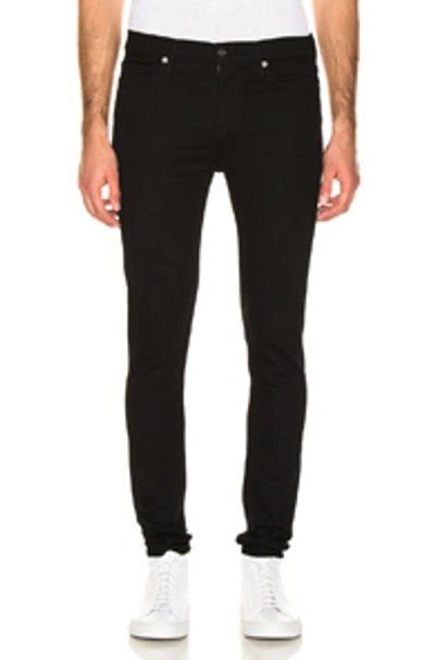 Shop Frame Jagger Skinny Jeans In Black