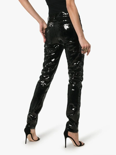 Shop Saint Laurent Sequin Embellished Slim-fit Jeans In 1080 - Black