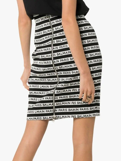 Shop Balmain Stripe Logo Pencil Skirt In C057 Black