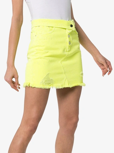 Shop Amiri High-waisted Distressed Denim Mini-skirt In Neon Yellow