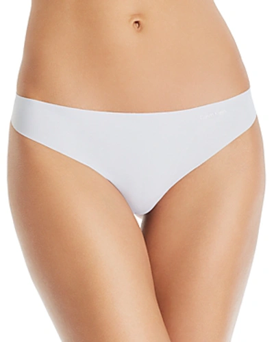 Shop Calvin Klein Invisibles Thong In Vent