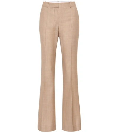 Shop Victoria Beckham Wool High-rise Flared Pants In Beige