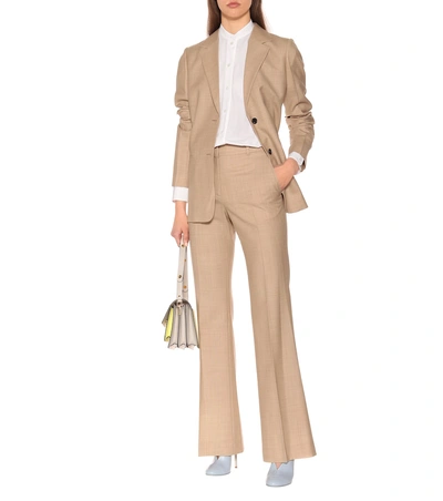 Shop Victoria Beckham Wool High-rise Flared Pants In Beige