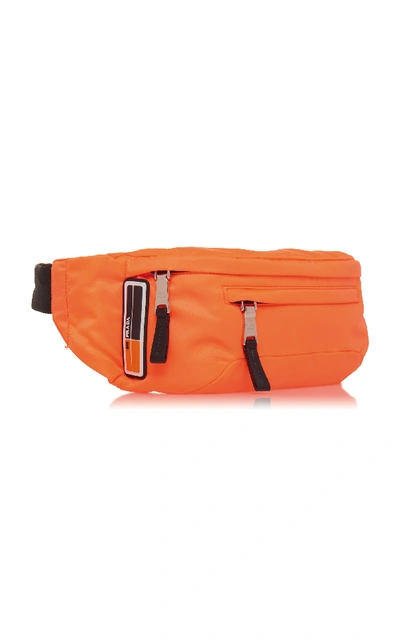 Shop Prada Orange Nylon Hip Bag With Rubber Logo