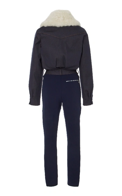 Shop Cordova Courchevel Shearling-trimmed Denim Jumpsuit In Blue