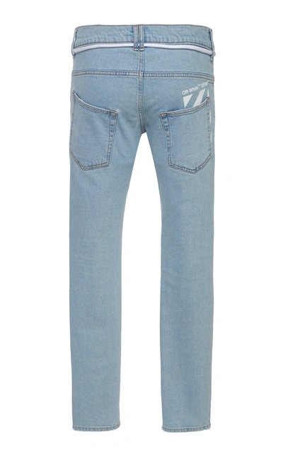 Shop Off-white Tassel Belted Low-rise Skinny Jeans In Light Wash