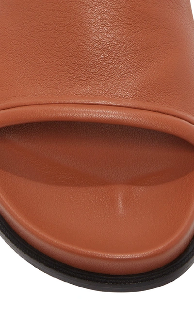 Shop Loewe Cutout Leather Slides In Brown