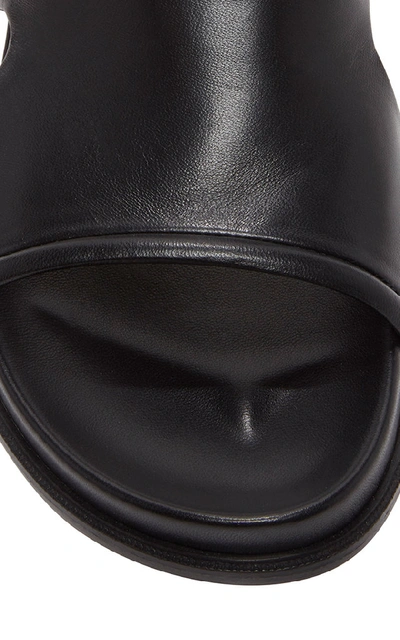 Shop Loewe Cutout Leather Slides In Black