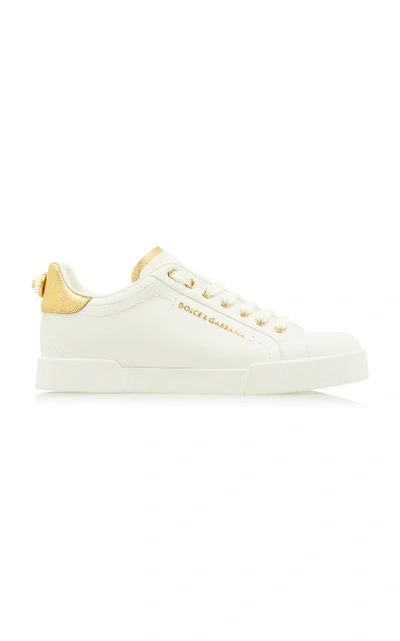 Shop Dolce & Gabbana Portofino Patent Leather-trimmed Sneakers In Gold