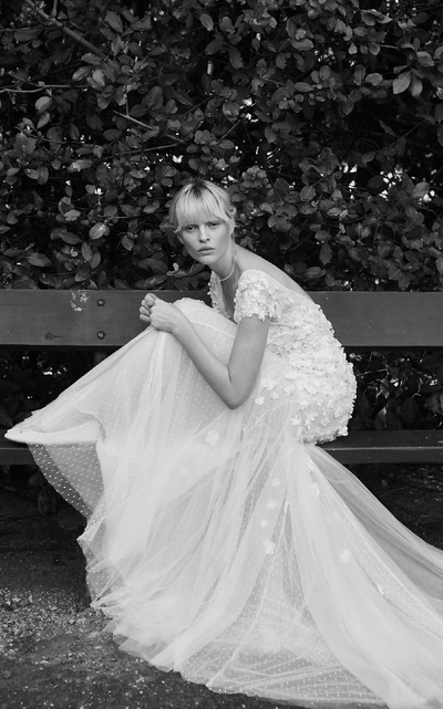 Shop Costarellos Bridal V Neckline Flower Embellished Mermaid Gown In White
