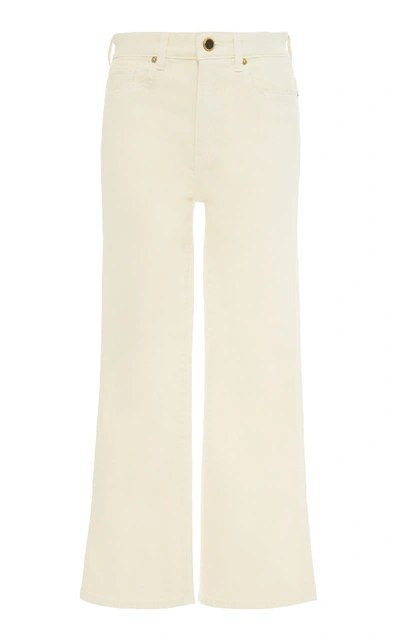 Shop Khaite Benny Mid-rise Crop Flare Jeans In Neutral