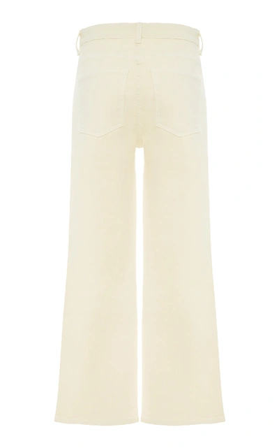 Shop Khaite Benny Mid-rise Crop Flare Jeans In Neutral