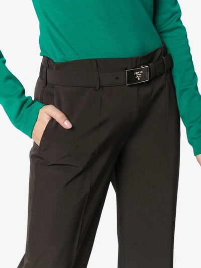 Shop Prada Technical Fabric Trousers In Black